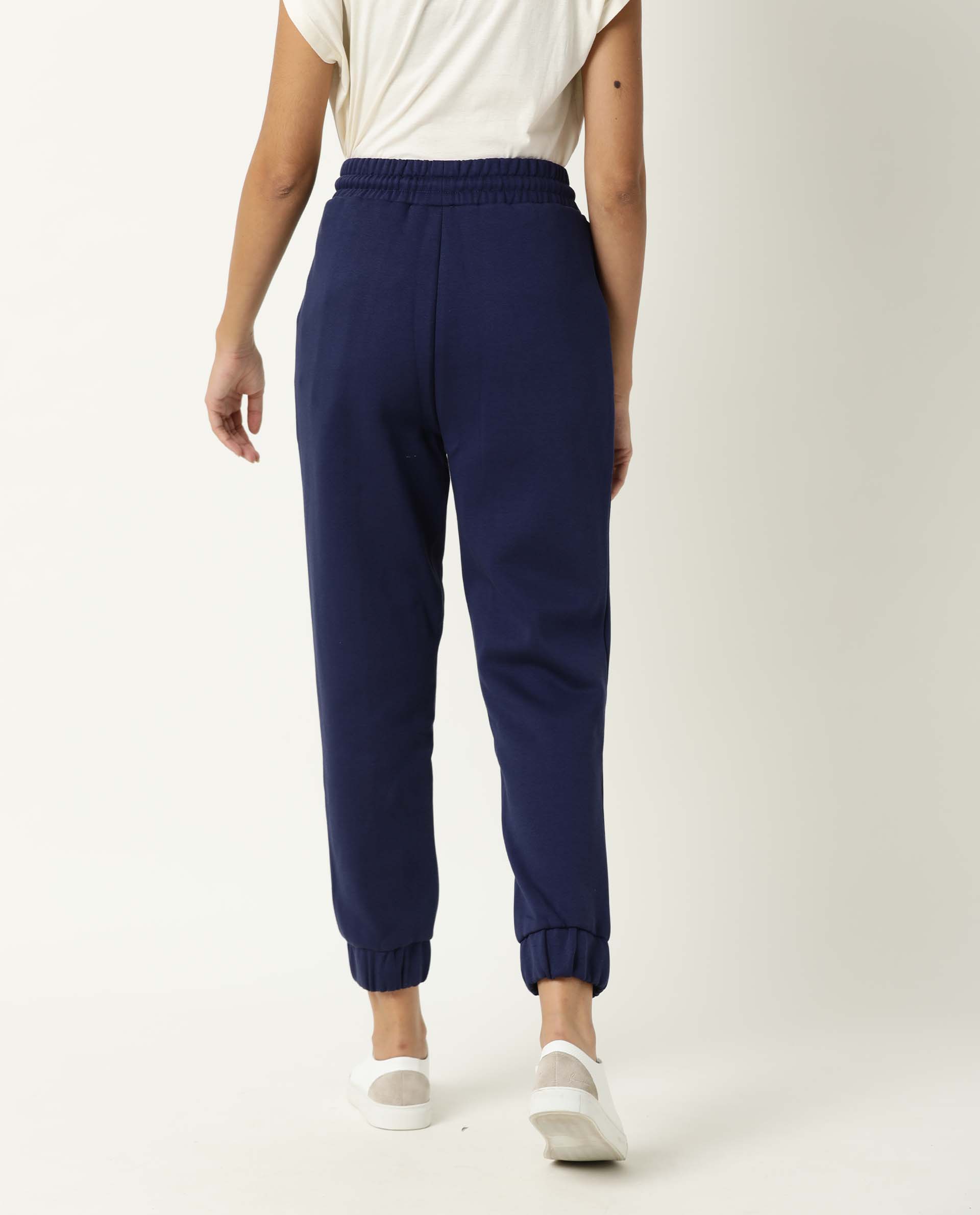 Rareism Women Neo Blue Poly Cotton Fabric Tailored Fit Solid Mid Rise Ankle Length Track Pant