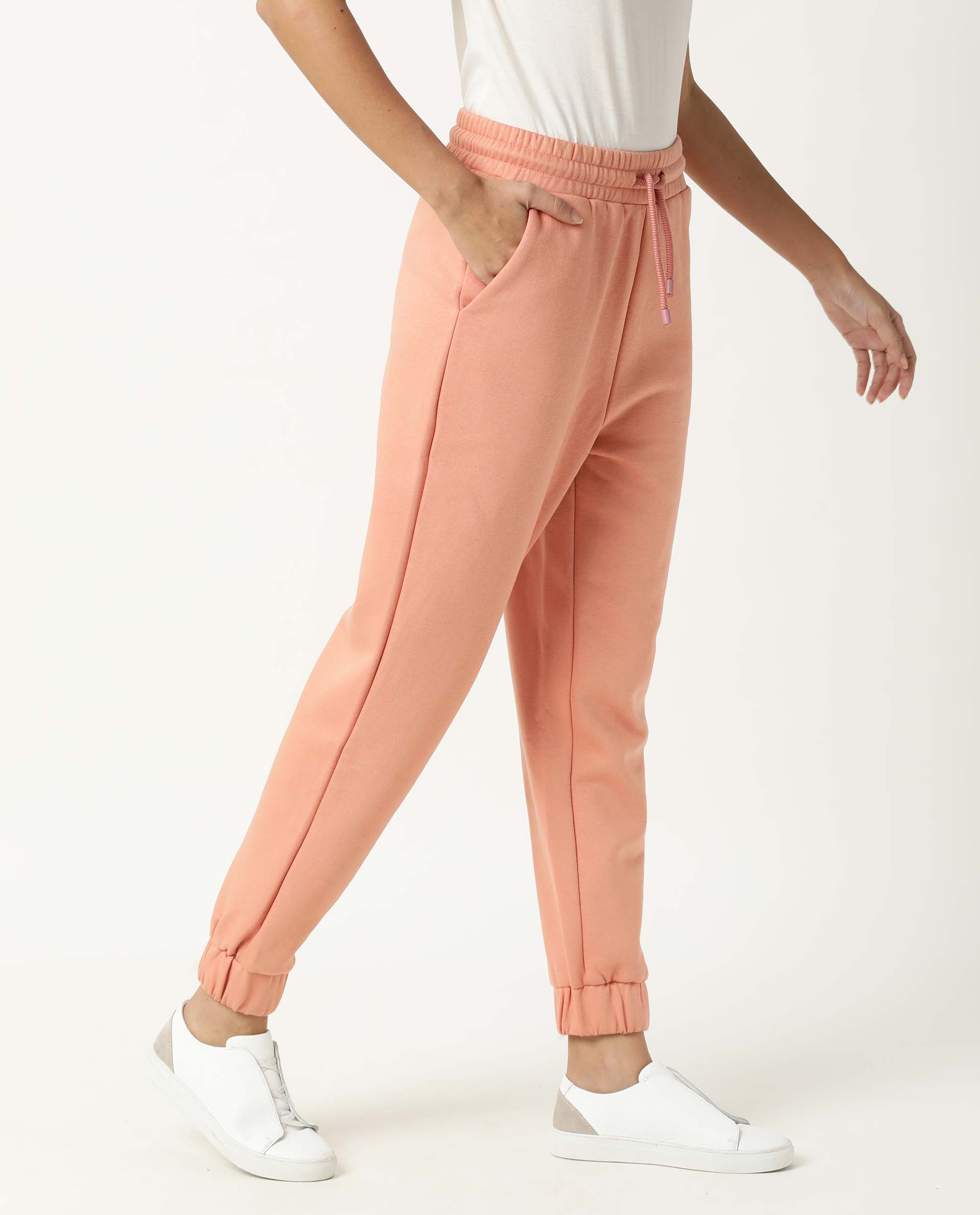Rareism Women Neo Orange Poly Cotton Fabric Tailored Fit Solid Mid Rise Ankle Length Track Pant