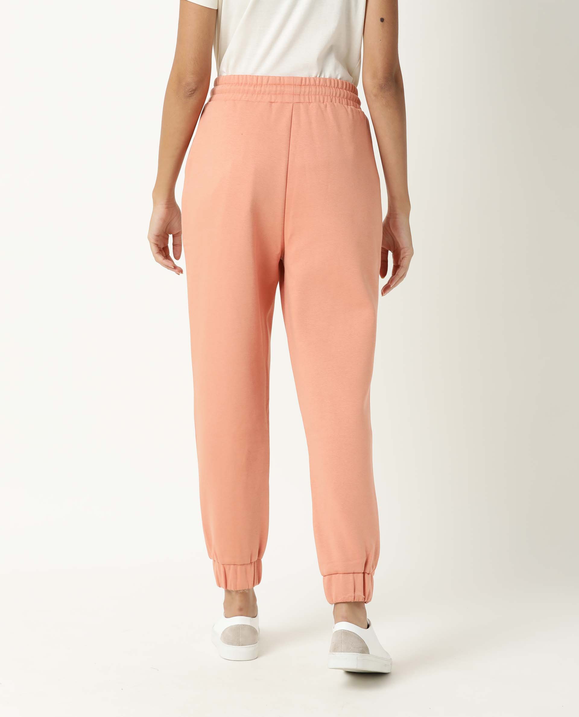 Rareism Women Neo Orange Poly Cotton Fabric Tailored Fit Solid Mid Rise Ankle Length Track Pant