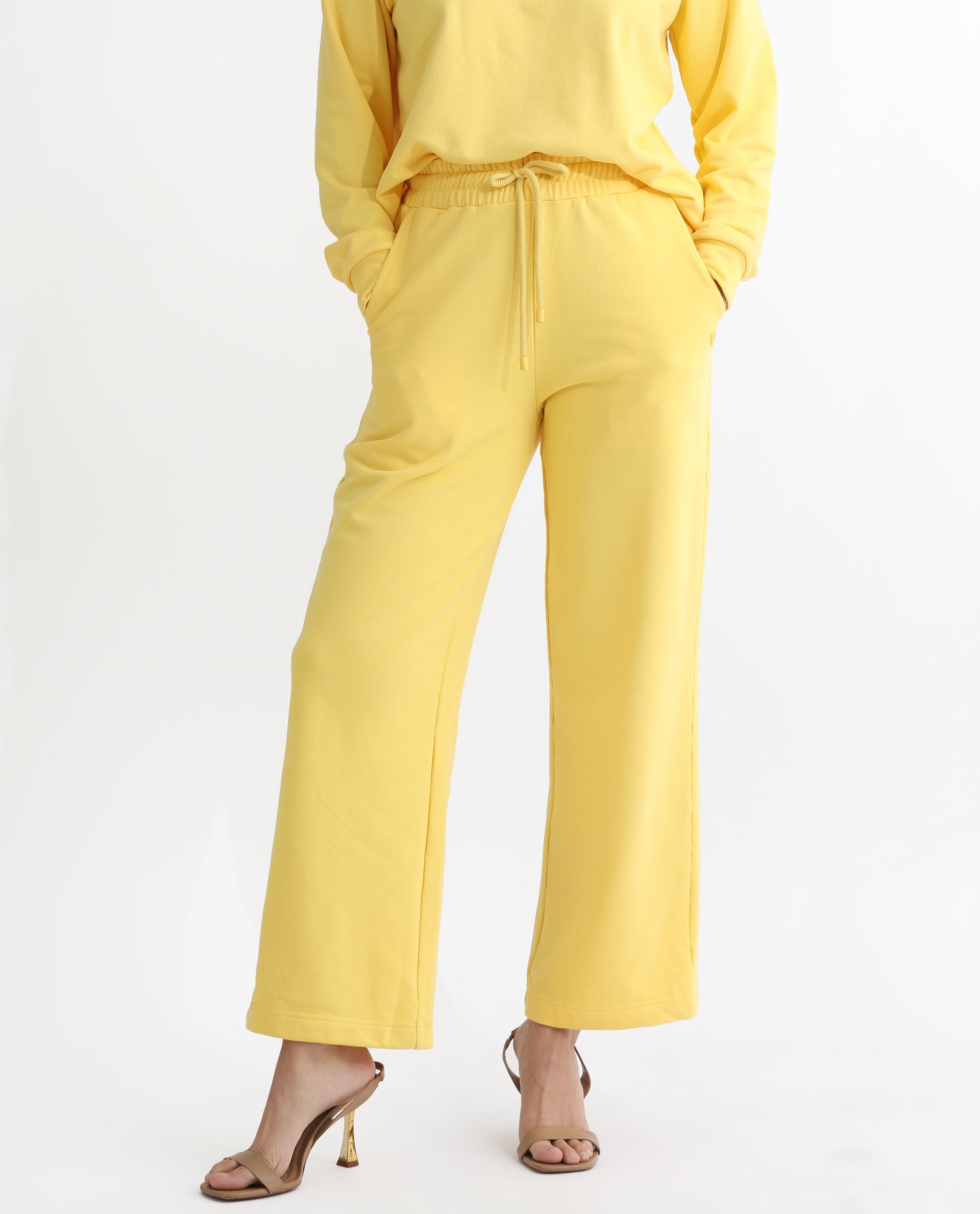 Rareism Women's Pazoo T Yellow Cotton Blend Plain Ankle Length Flared Track Pant