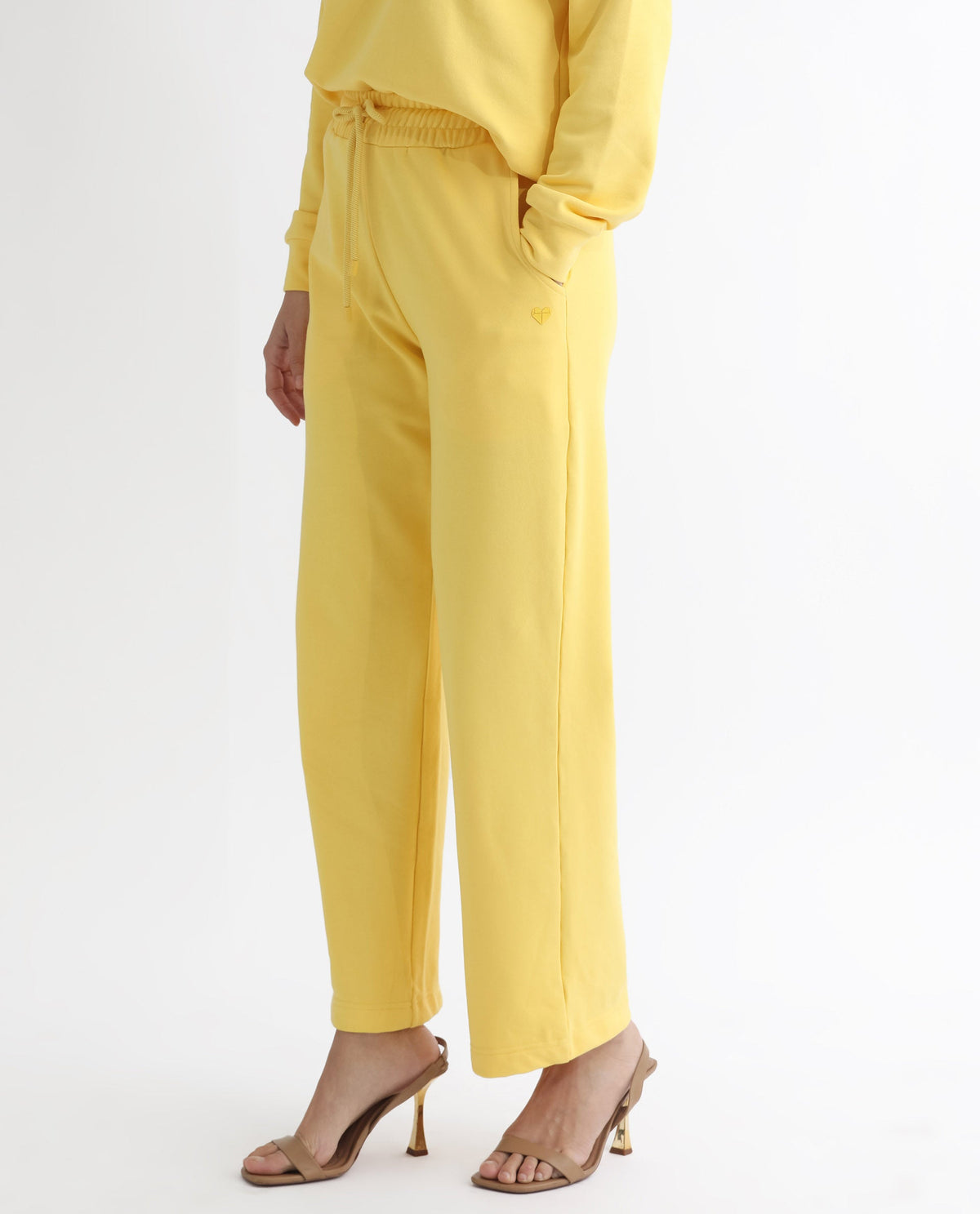 Rareism Articale Women Pazoo T Yellow Cotton Blend Fabric Drawstring Closure Flared Fit Plain Ankle Length Track Pant