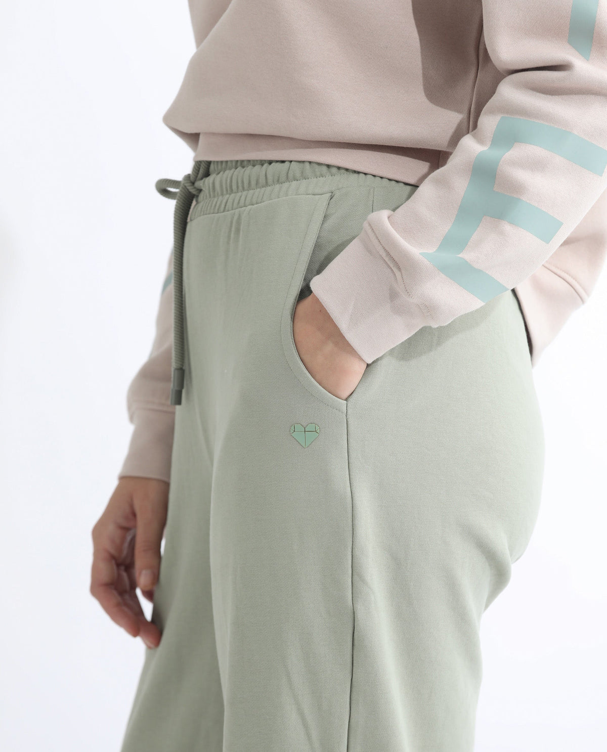 Rareism Women Pazoo T Dusky Green Cotton Blend Fabric Flared Solid Mid Rise Ankle Length Track Pant