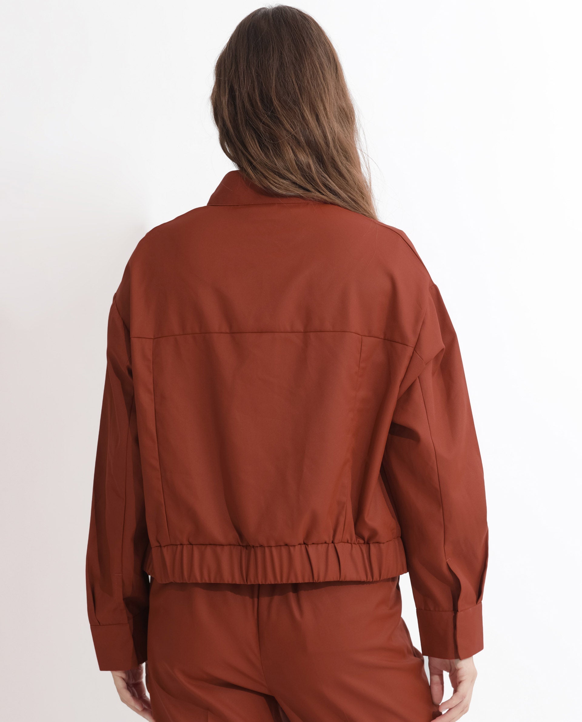 Rareism Articale Women Ruks Rust Polyester Fabric Full Sleeves Button Closure High Neck Regular Fit Plain Jacket