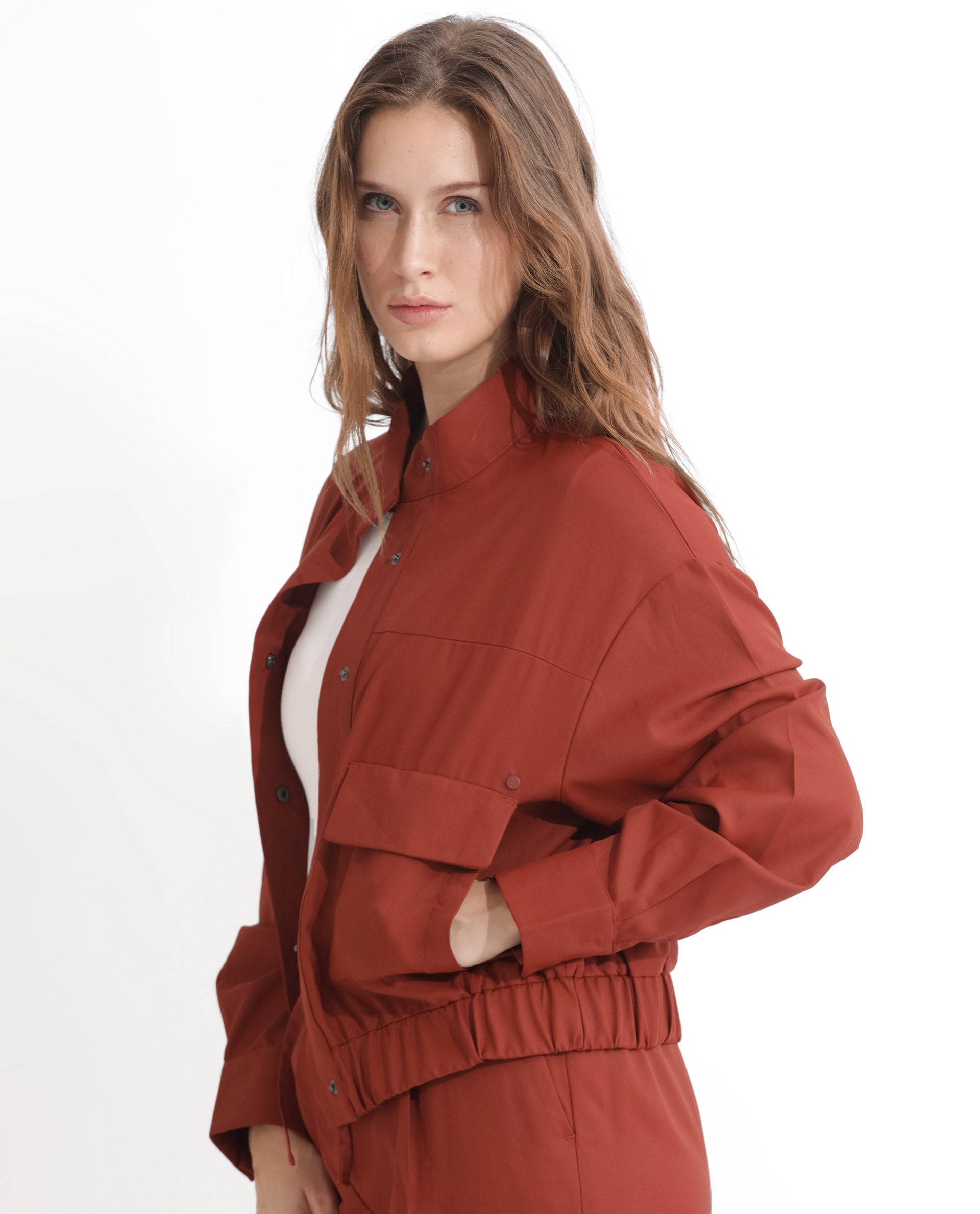Rareism Articale Women Ruks Rust Polyester Fabric Full Sleeves Button Closure High Neck Regular Fit Plain Jacket