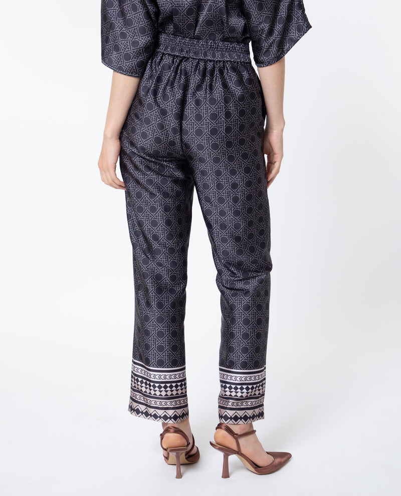 Rareism Women Sepiat Dark Black Polyester Fabric Relaxed Fit Geometric Print Ankle Length Trousers