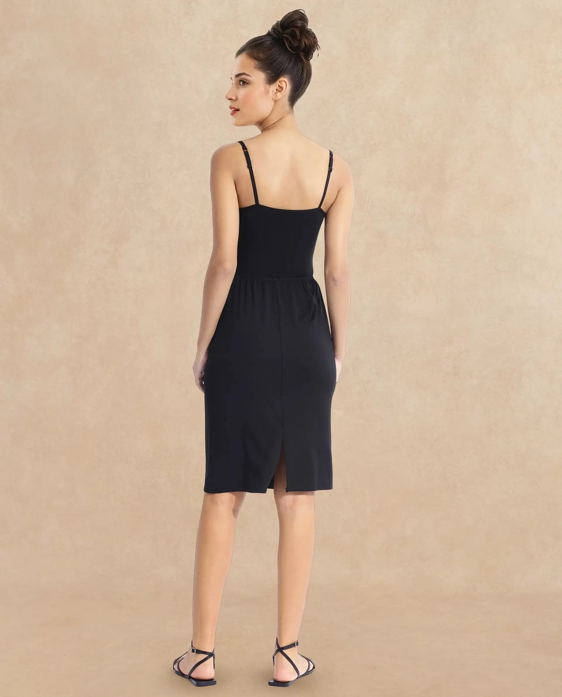 Rareism Women's Slippyaa Black Shoulder Strap Plain Shoulder Strap Knee Length Straight Fit Inner Wear