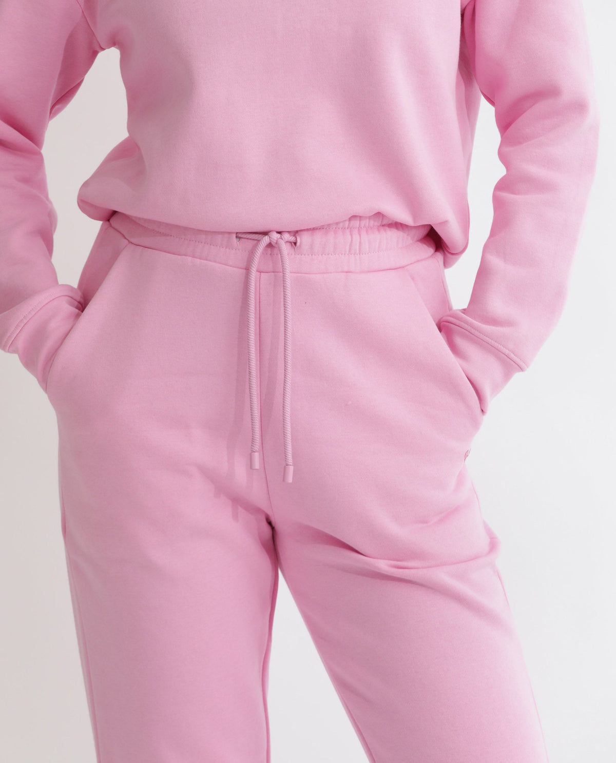 Rareism Women Terac F Light Pink Poly Cotton Fabric Regular Fit Solid Mid Rise Ankle Length Track Pant