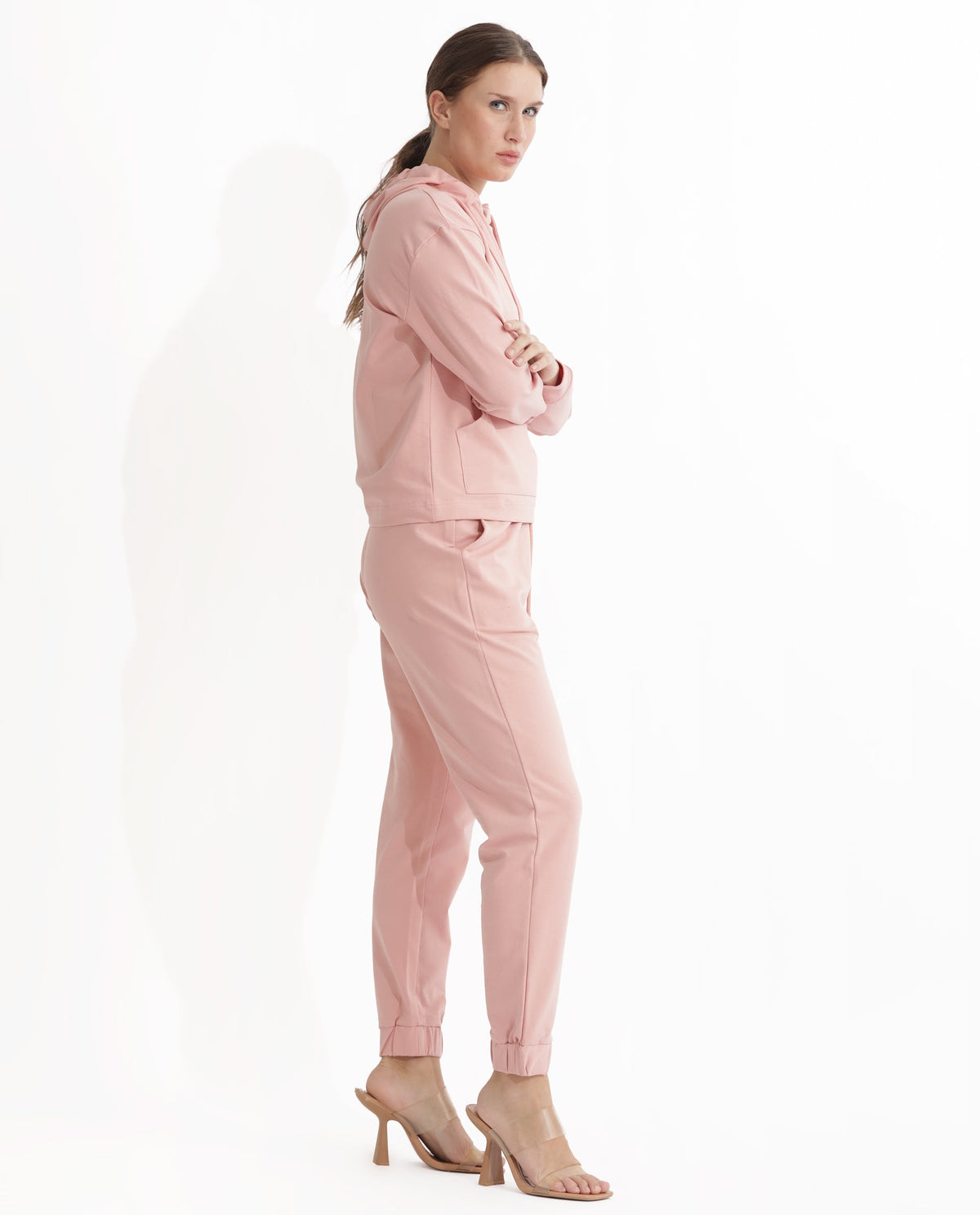 Rareism Women Terac Light Orange Cotton Lycra Fabric Regular Fit Solid Mid Rise Ankle Length Track Pant
