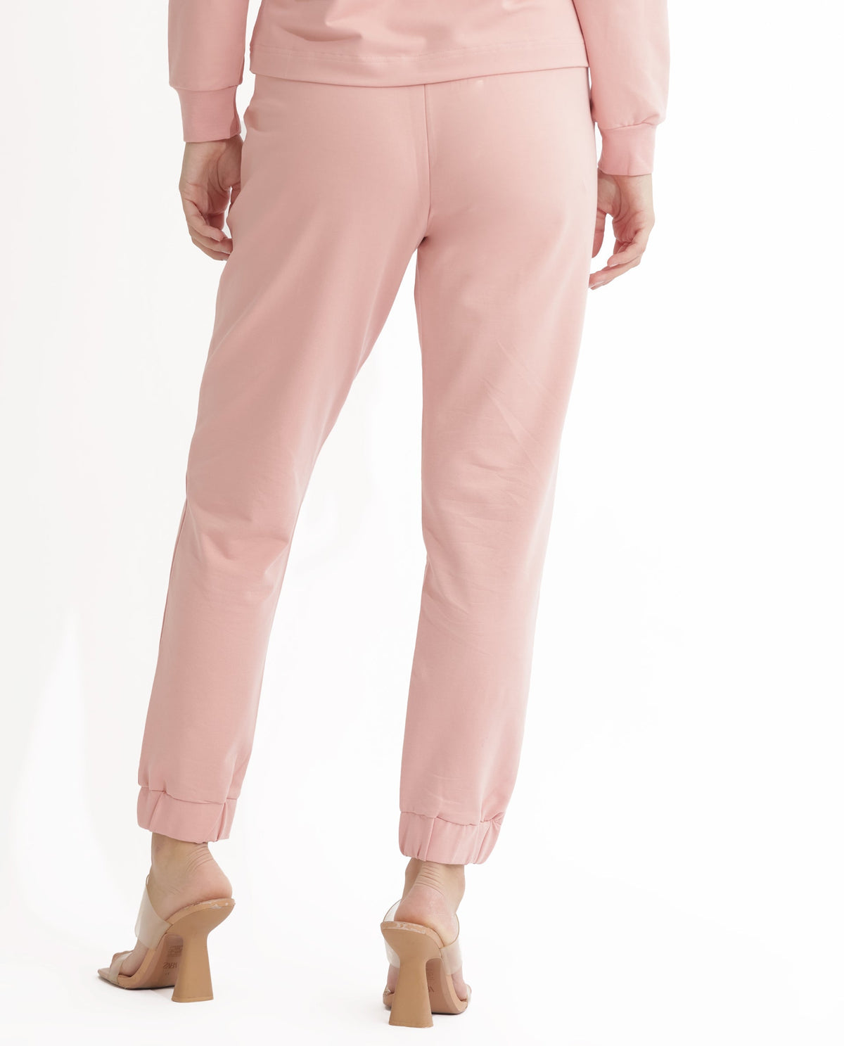 Rareism Women Terac Light Orange Cotton Lycra Fabric Regular Fit Solid Mid Rise Ankle Length Track Pant