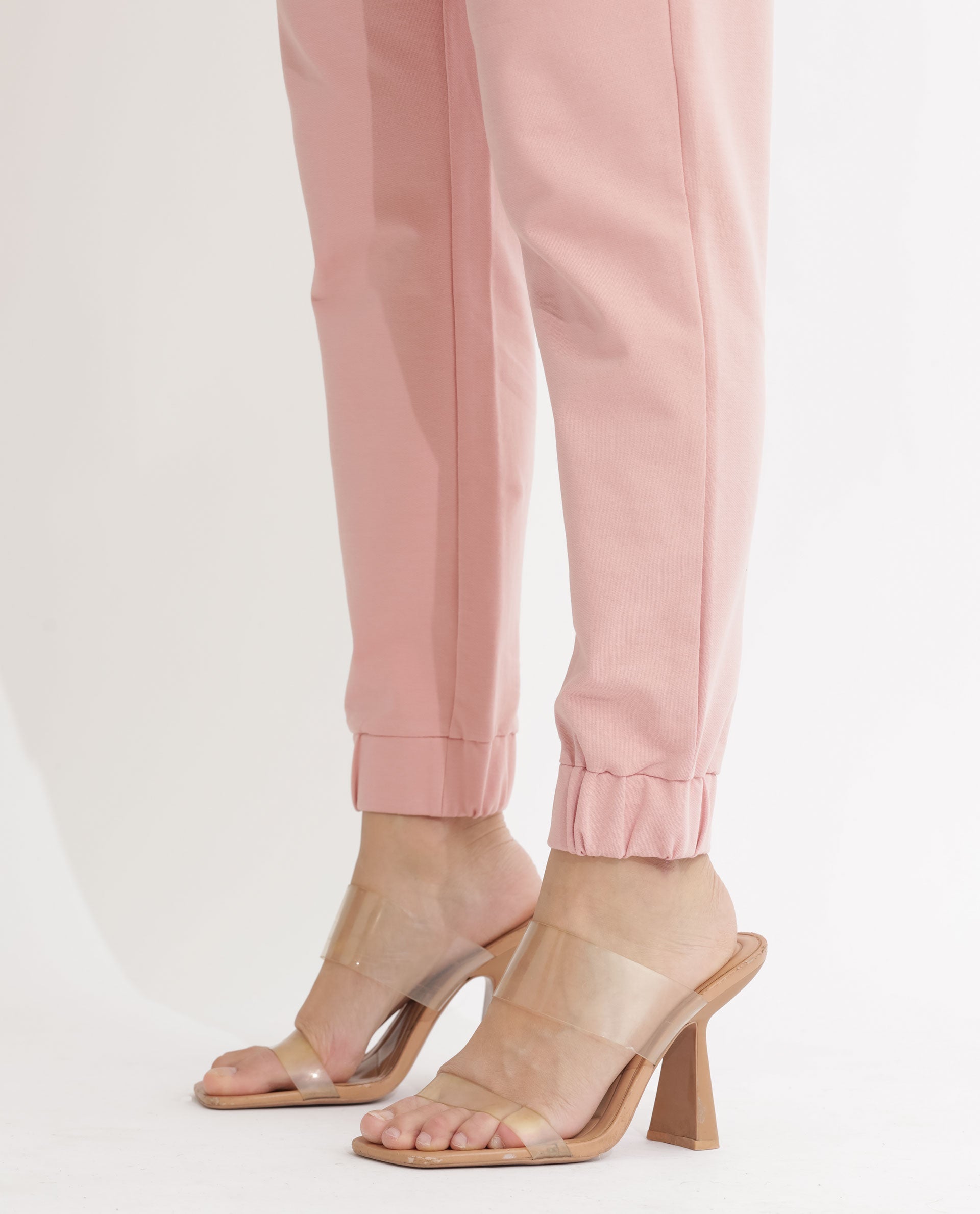 Rareism Women Terac Light Orange Cotton Lycra Fabric Regular Fit Solid Mid Rise Ankle Length Track Pant