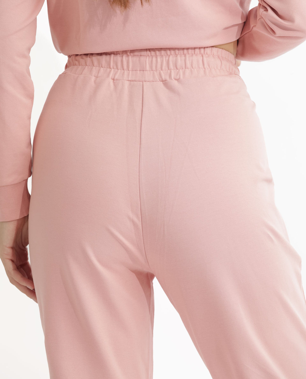 Rareism Women Terac Light Orange Cotton Lycra Fabric Regular Fit Solid Mid Rise Ankle Length Track Pant