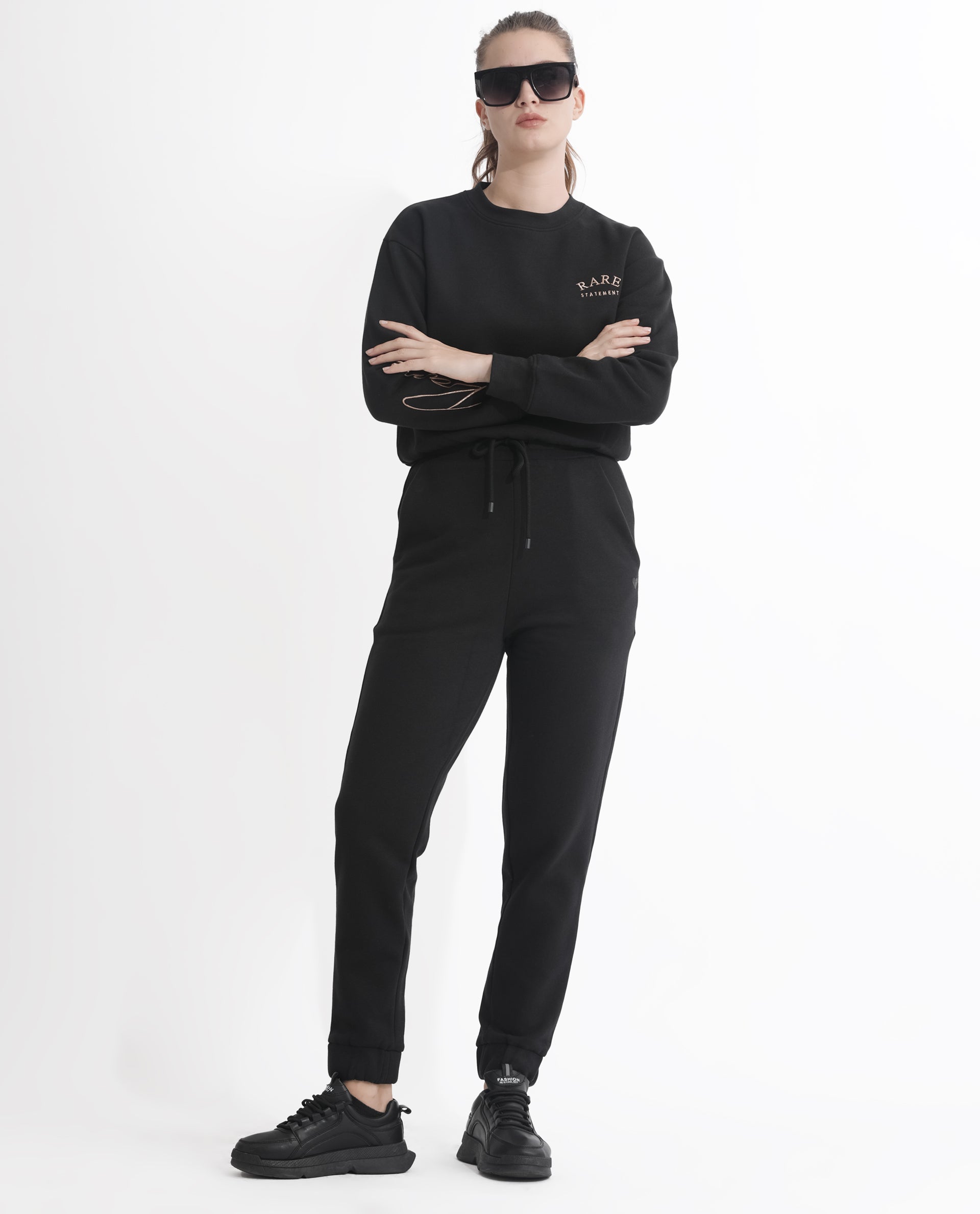 Rareism Women Terac F Black Poly Cotton Fabric Regular Fit Solid Mid Rise Ankle Length Track Pant