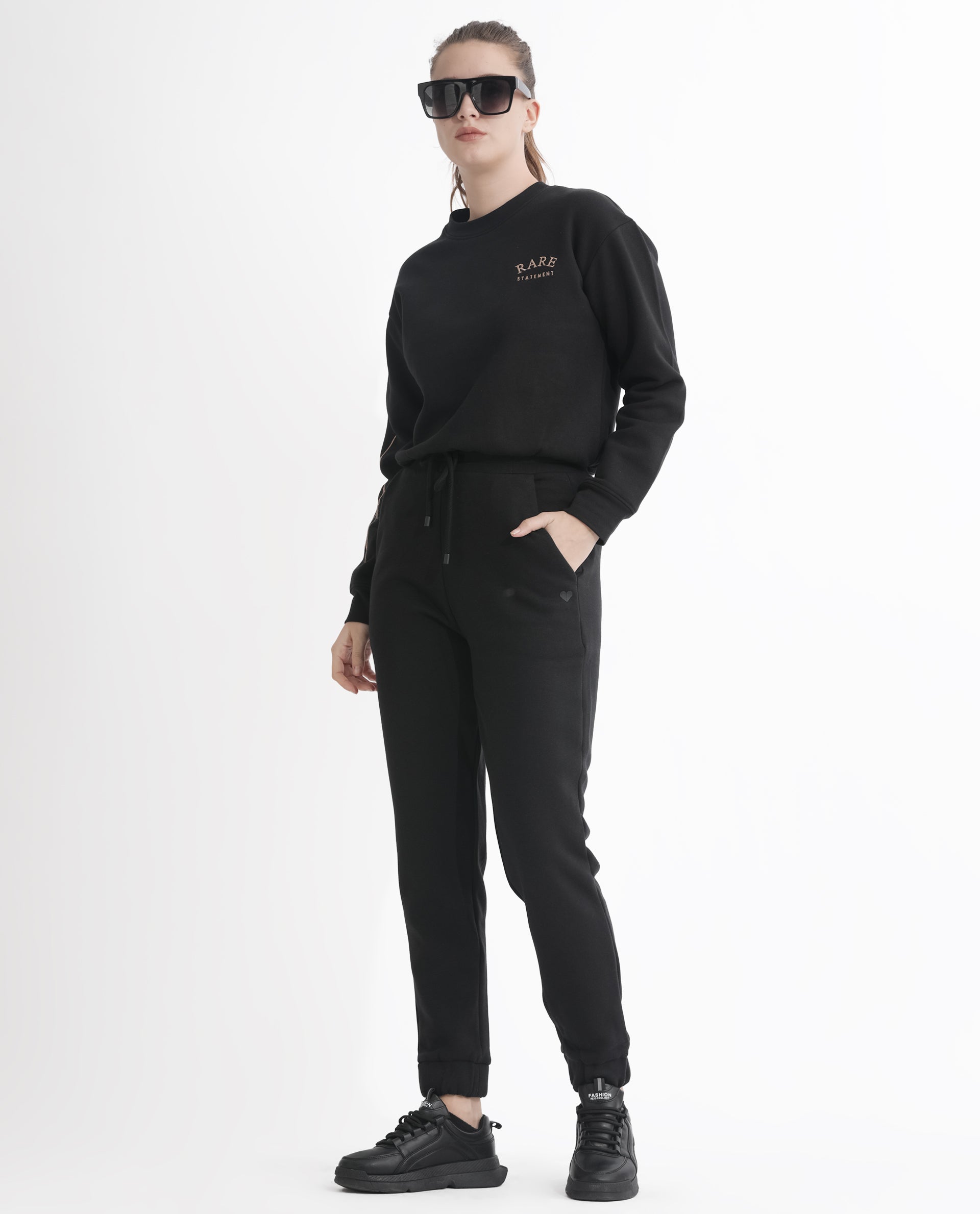 Rareism Women Terac F Black Poly Cotton Fabric Regular Fit Solid Mid Rise Ankle Length Track Pant