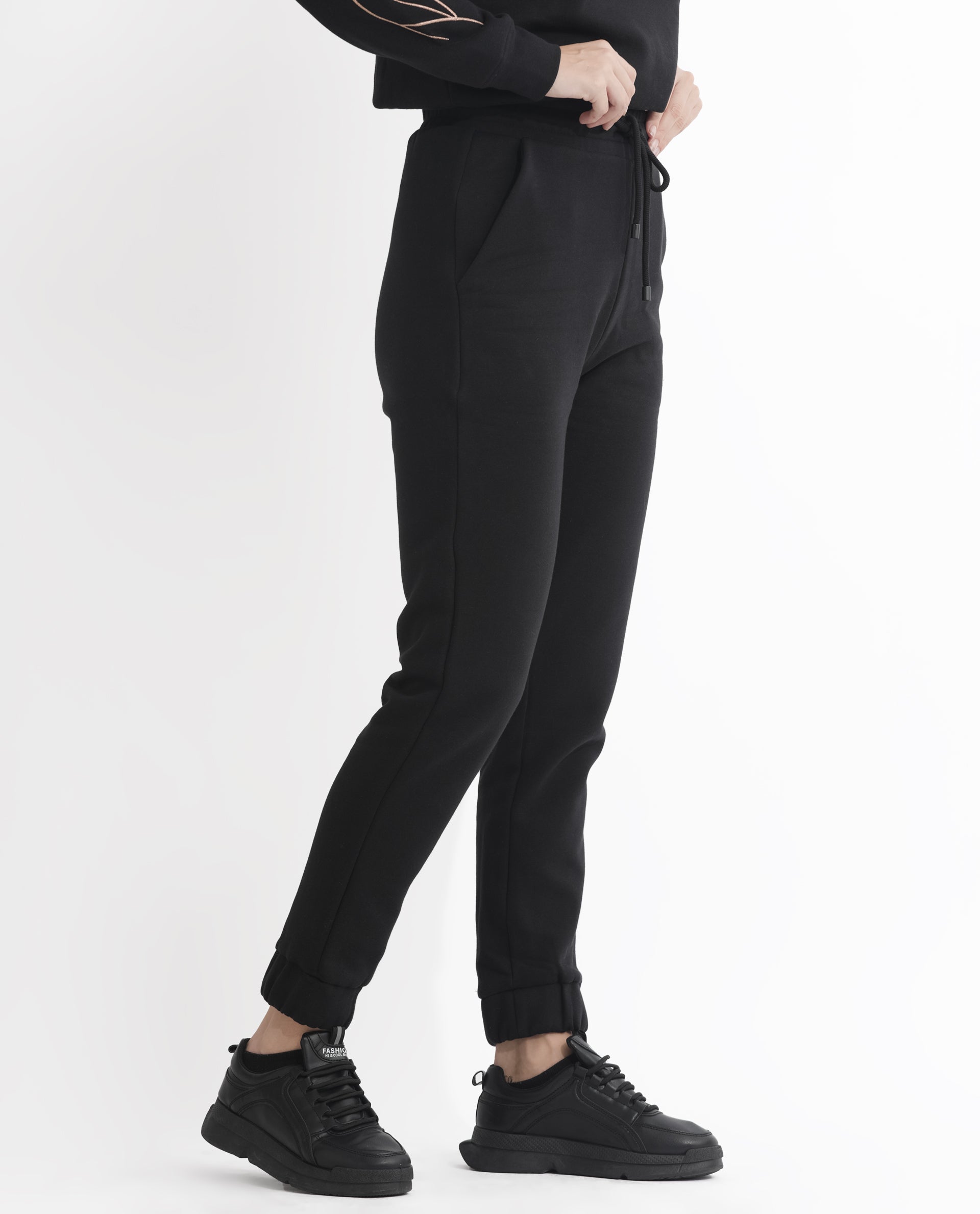 Rareism Women Terac F Black Poly Cotton Fabric Regular Fit Solid Mid Rise Ankle Length Track Pant
