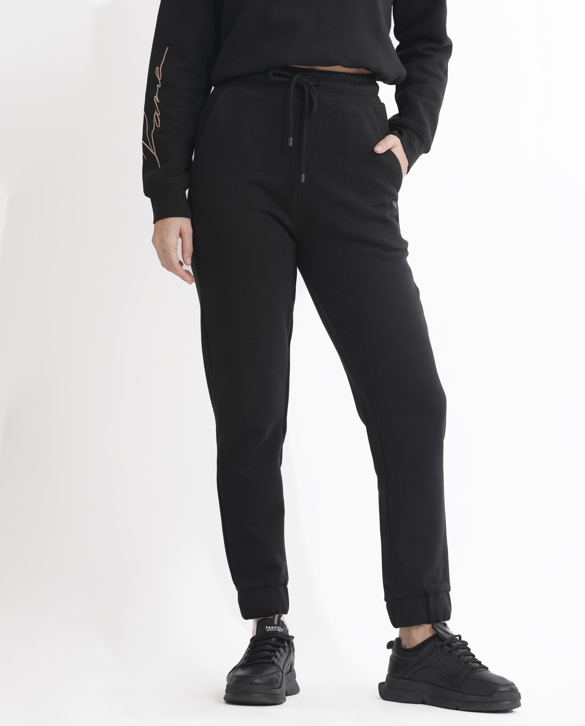 Rareism Women Terac F Black Poly Cotton Fabric Regular Fit Solid Mid Rise Ankle Length Track Pant