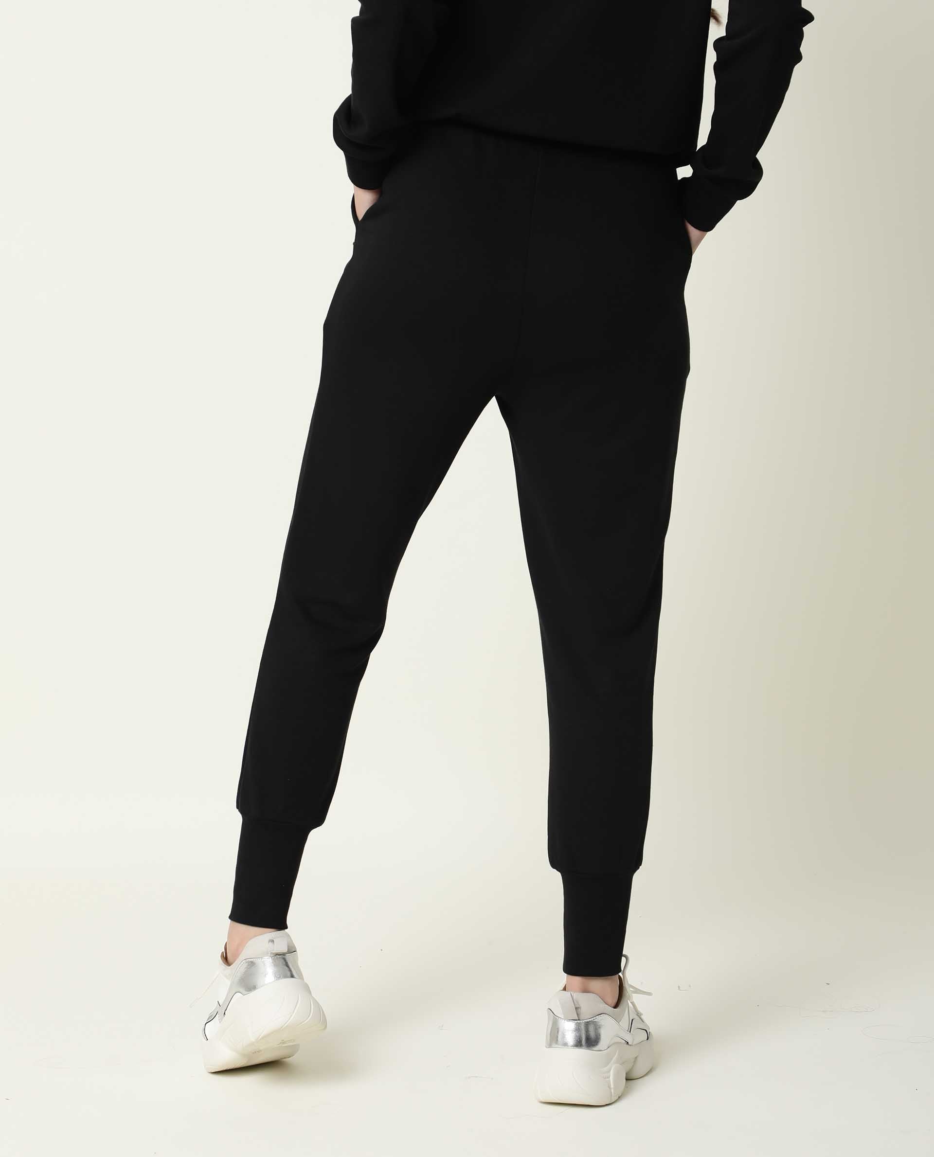 Rareism Women Simp-1 Black Poly Cotton Fabric Regular Fit Solid Mid Rise Ankle Length Track Pant
