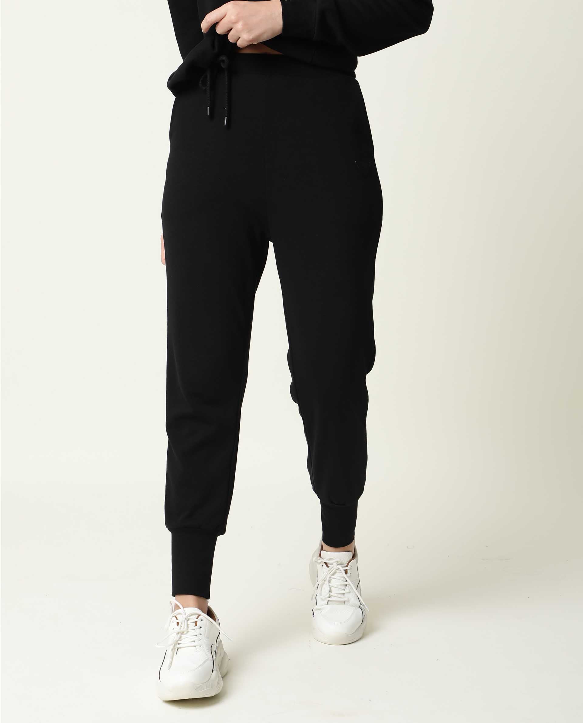 Rareism Women Simp-1 Black Poly Cotton Fabric Regular Fit Solid Mid Rise Ankle Length Track Pant