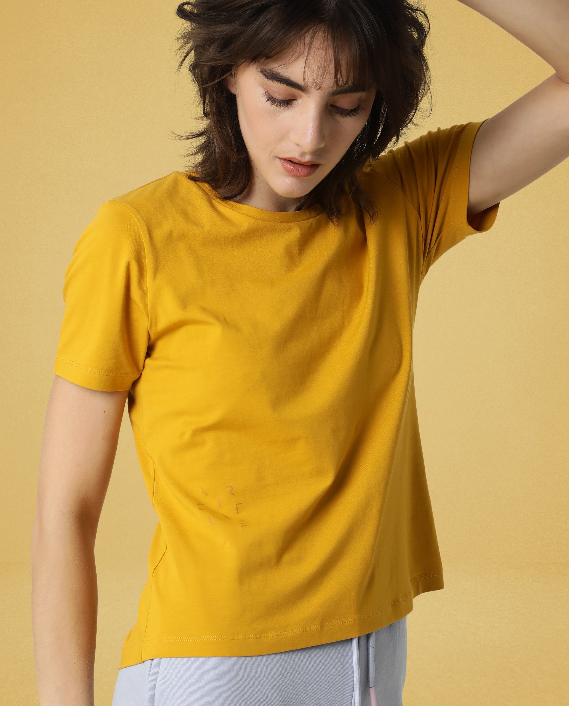 Rareism Women Alcas Mustard Cotton Blend Fabric Regular Fit Half Sleeves Solid Round Neck T-Shirt