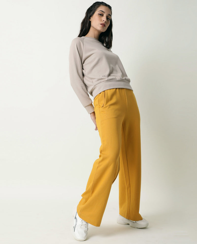 Rareism Women Capsule Mustard Cotton Blend Fabric Relaxed Fit Solid Mid Rise Ankle Length Track Pant