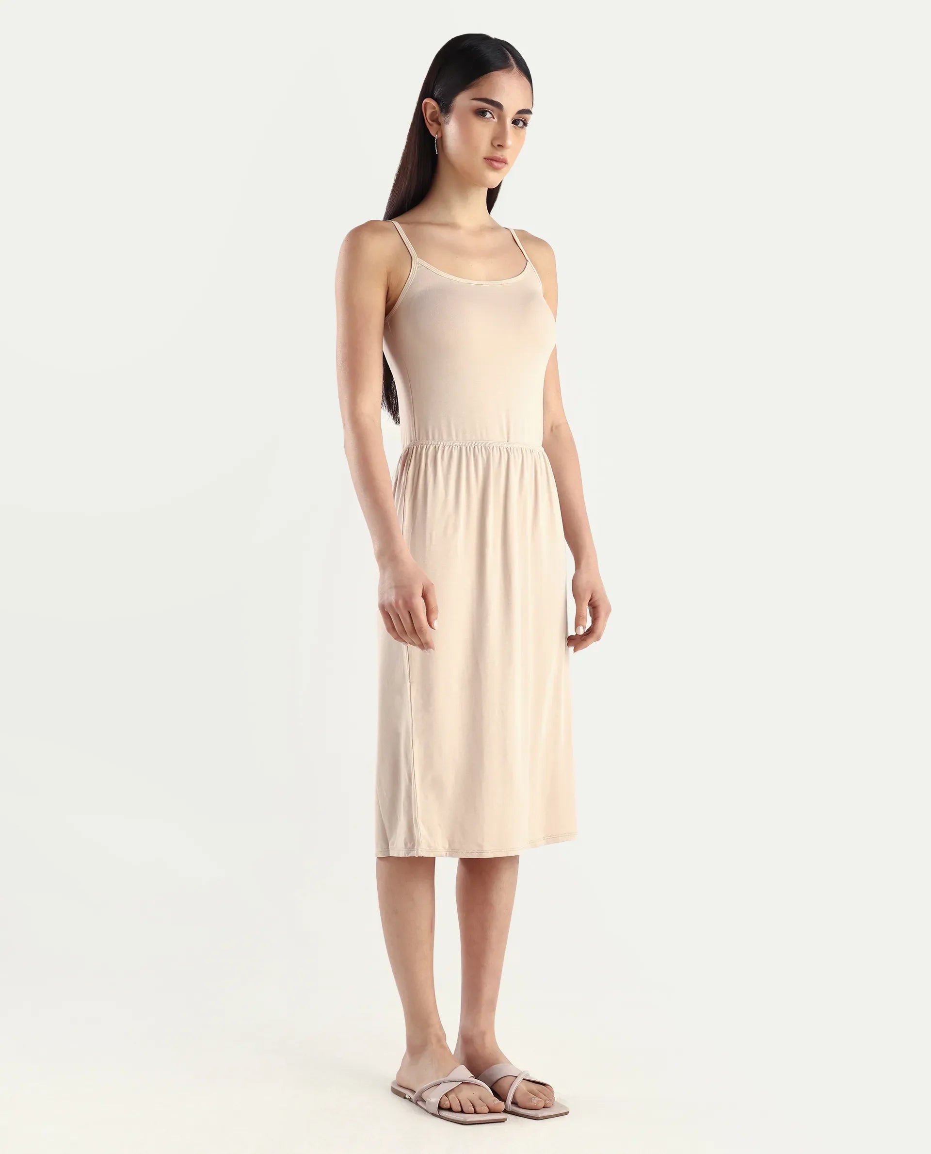Rareism Women's Slippyaa Beige Shoulder Strap Plain Shoulder Strap Knee Length Straight Fit Inner Wear