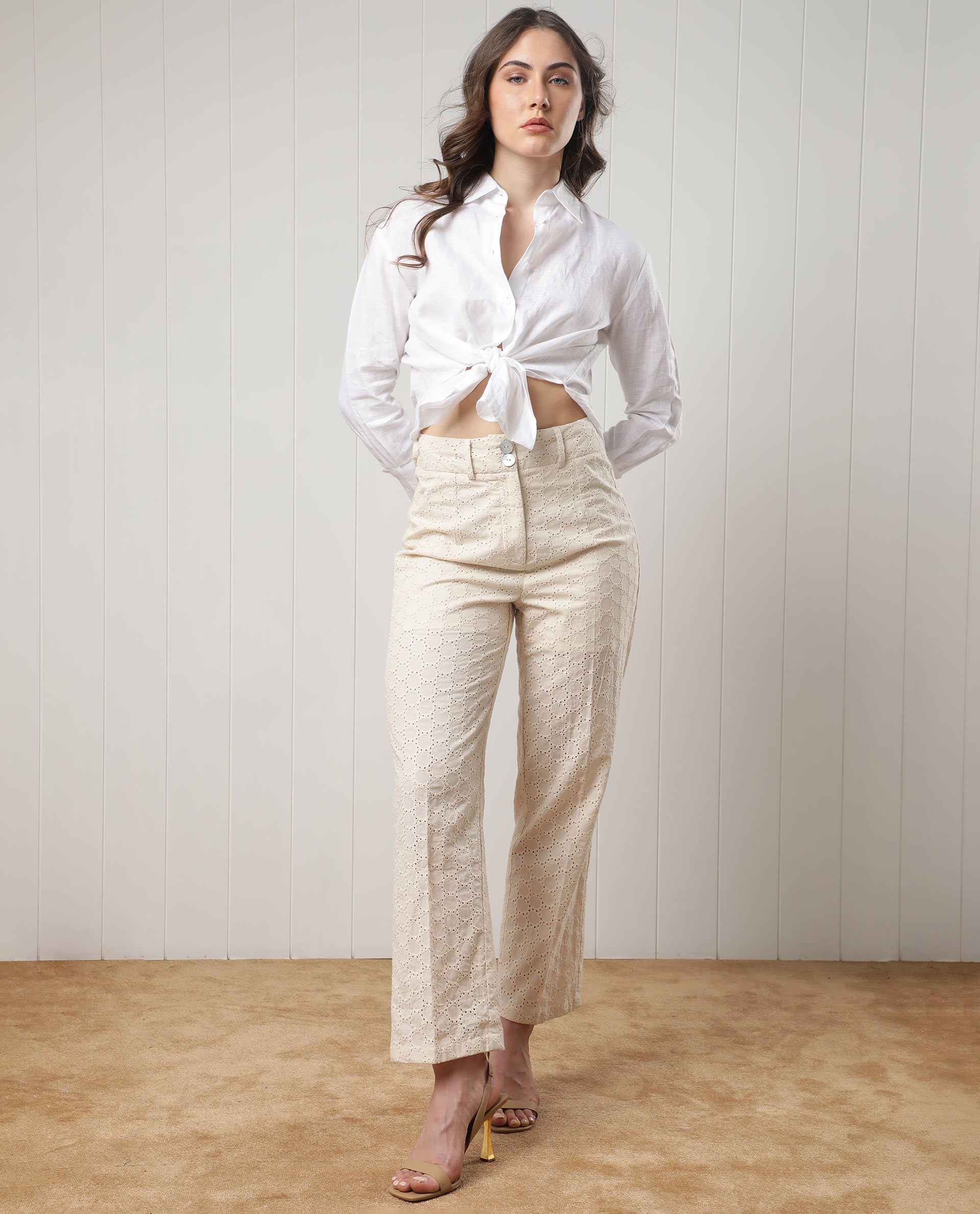 Buy Arrow Woman Women Solid Tapered Fit Trousers - NNNOW.com